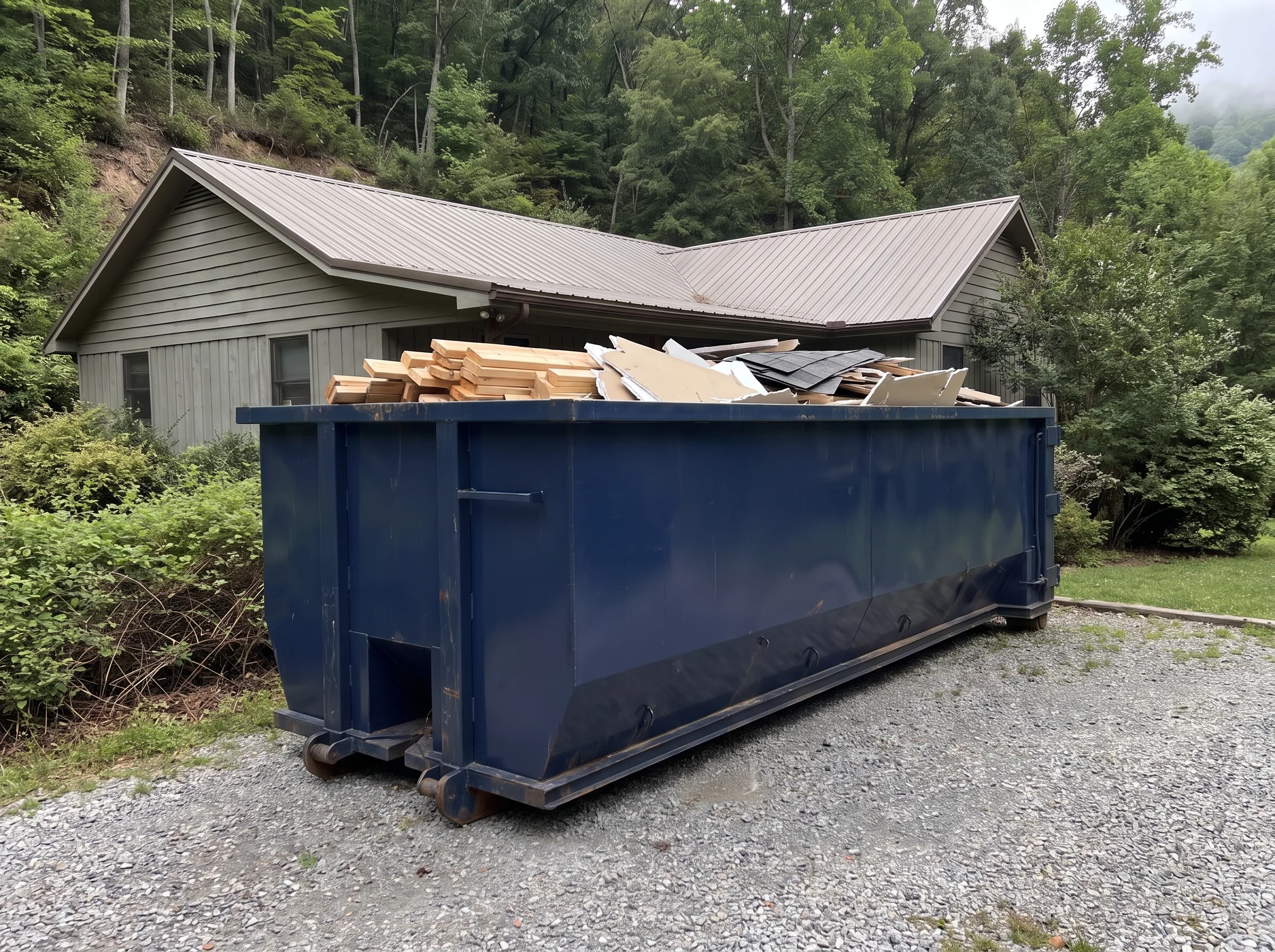 Roll-off dumpster being loaded in Hawaii